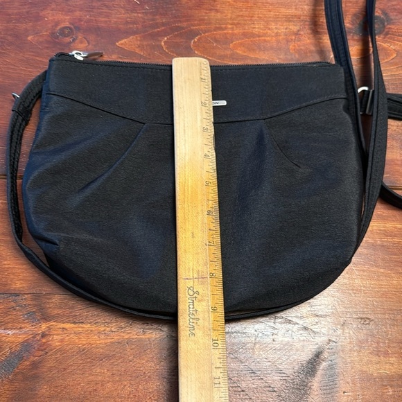 Travelon Black crossbody security travel bag with purse light NWOT - Picture 9 of 9